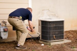 Inspecting Heat Pump Leak